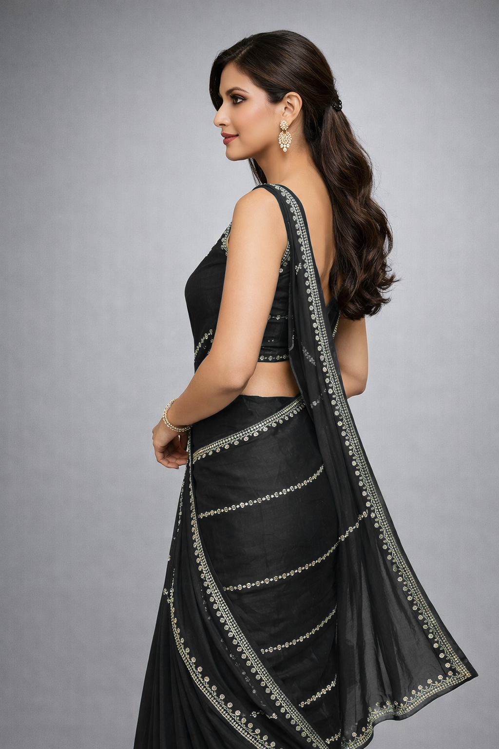 Black Elegant Saree with Golden Stone Work