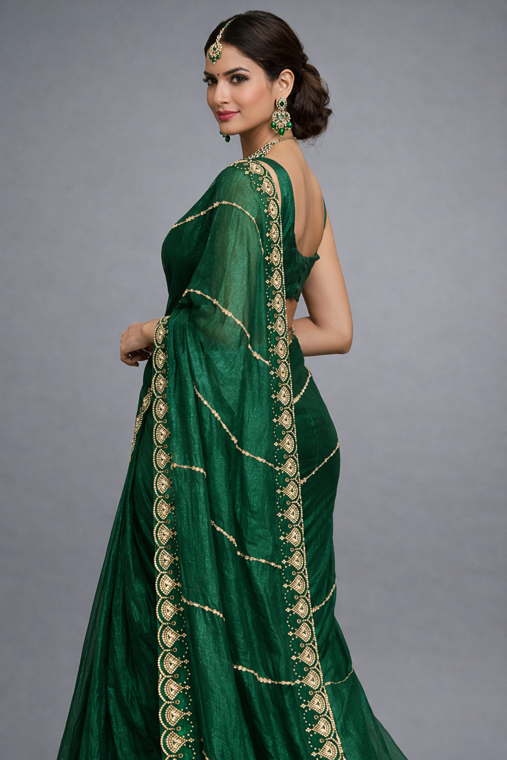 Luxury Emerald Green Saree with Intricate Golden Stone Work