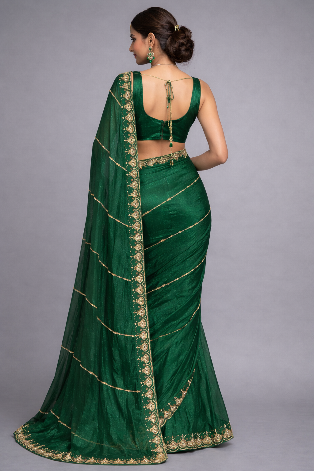 Luxury Emerald Green Saree with Intricate Golden Stone Work